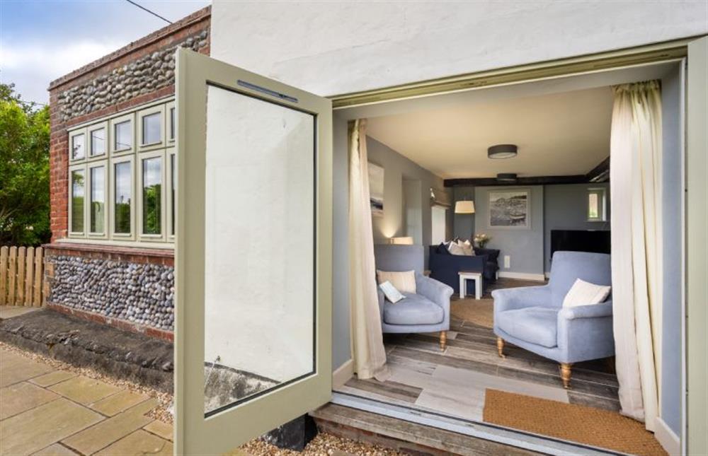 Ground floor: Rear door leading towards sitting room at Eastgate Cottage and Hideaway, Salthouse near Holt