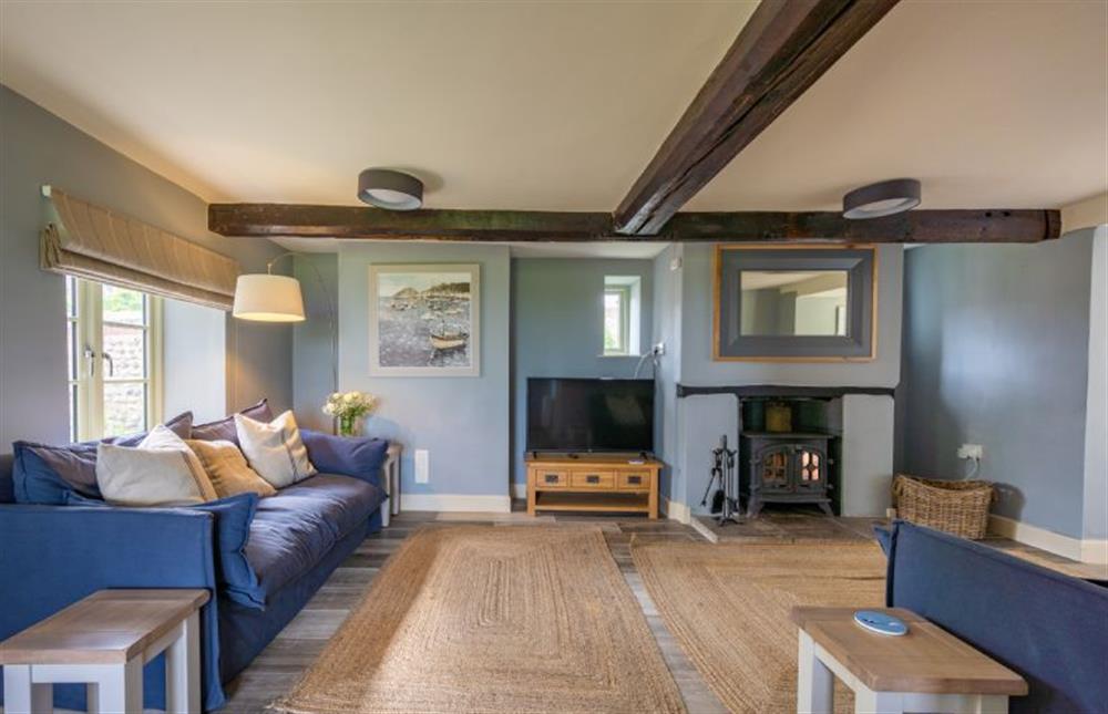 Ground floor: Spacious, stylish sitting room at Eastgate Cottage and Hideaway, Salthouse near Holt