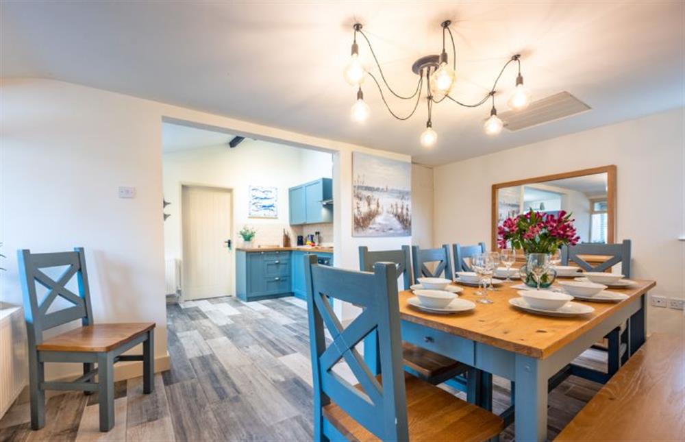 Ground floor: Stylish dining area with seating for eight at Eastgate Cottage and Hideaway, Salthouse near Holt