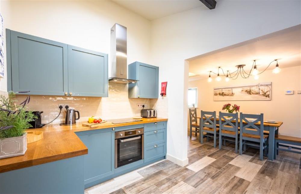 Ground floor: The cottage has a lovely shaker-style kitchen at Eastgate Cottage, Salthouse near Holt