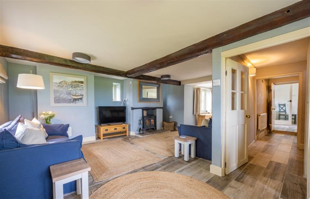Ground floor: The sitting room and hallway at Eastgate Cottage, Salthouse near Holt