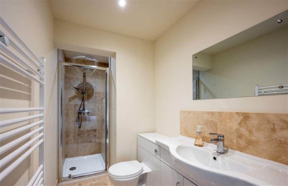 Ground floor: Shower room with heated towel rail at Eastgate Hideaway, Salthouse near Holt