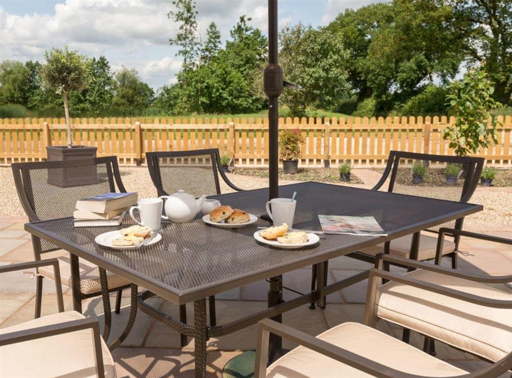 Outdoor eating area (photo 2) at Eastlands Barn in East Barkwith, near Market Rasen, Lincolnshire