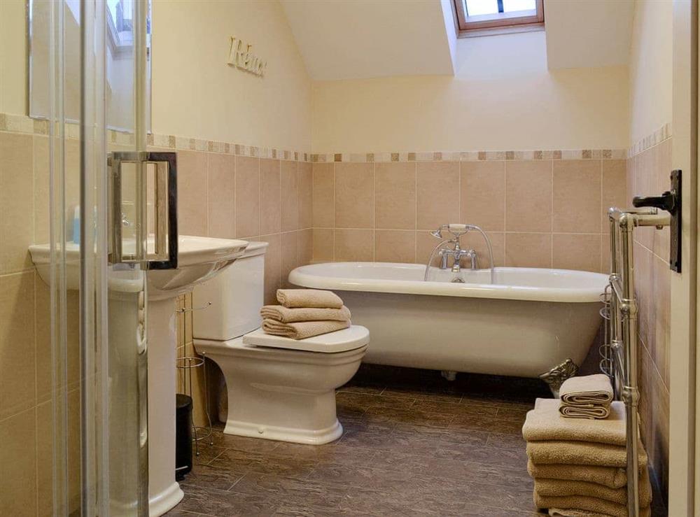 Family bathroom with bath and separate shower cubicle at Tawny Owl, 