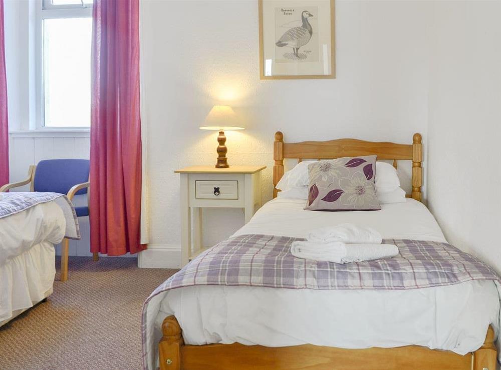 Bedroom with three single beds at Eastpark Farmhouse in Caerlaverock, near Dumfries, Dumfries and Galloway, Dumfriesshire
