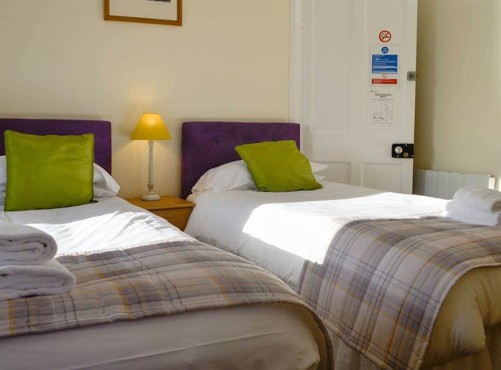 Comfy twin bedroom at Eastpark Farmhouse in Caerlaverock, near Dumfries, Dumfries and Galloway, Dumfriesshire