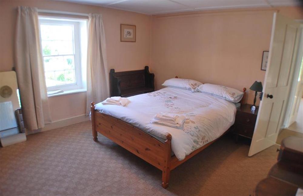Master bedroom with double bed at Eaton Cottage, Thornham near Hunstanton