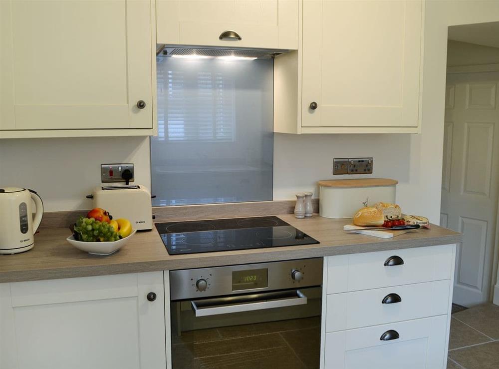 Attractive shaker style kitchen (photo 2) at Eden Cottage in Little Corby, near Carlisle, Cumbria