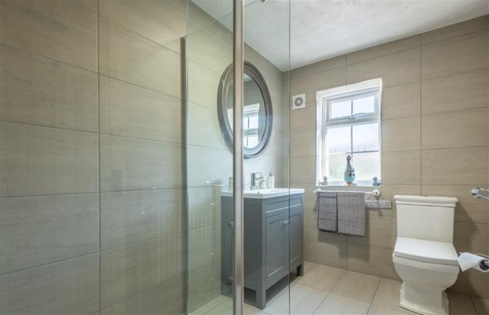 A smart family bathroom with large walk-in shower at Eden Cottage, Wells-next-the-Sea