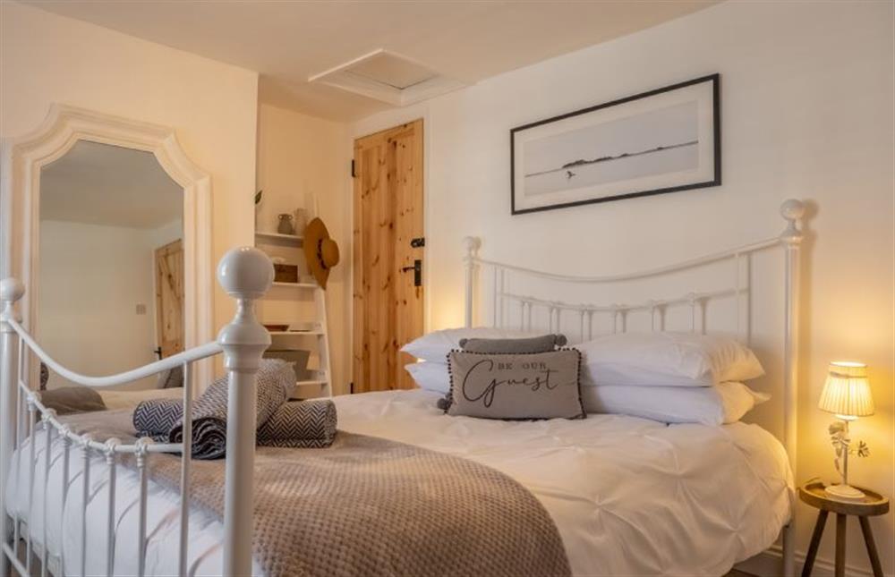 An inviting master bedroom awaits at Eden Cottage, Wells-next-the-Sea