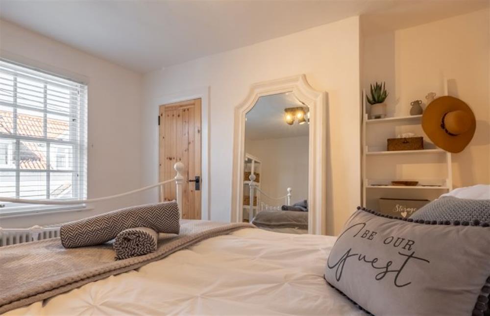 The master bedroom is light and airy at Eden Cottage, Wells-next-the-Sea