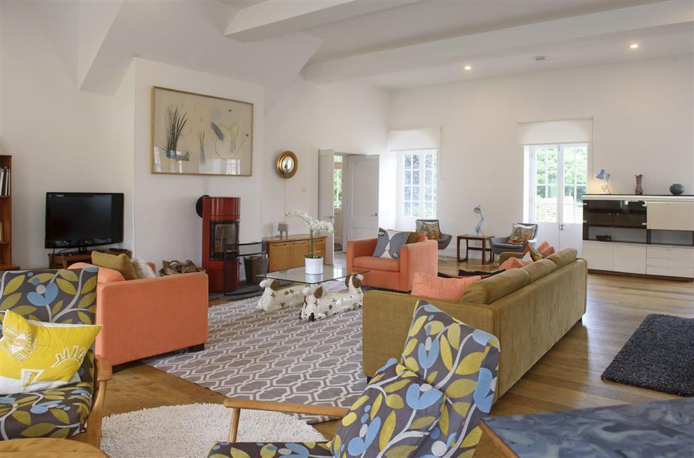 Sitting room, filled with colourful artwork