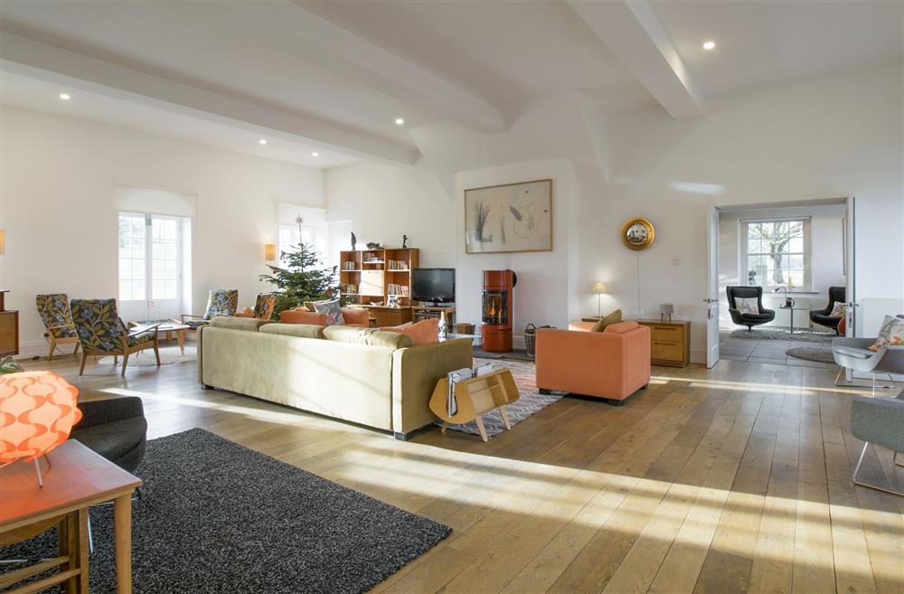 Trendy soft furniture sets the scene in this stunning sitting room