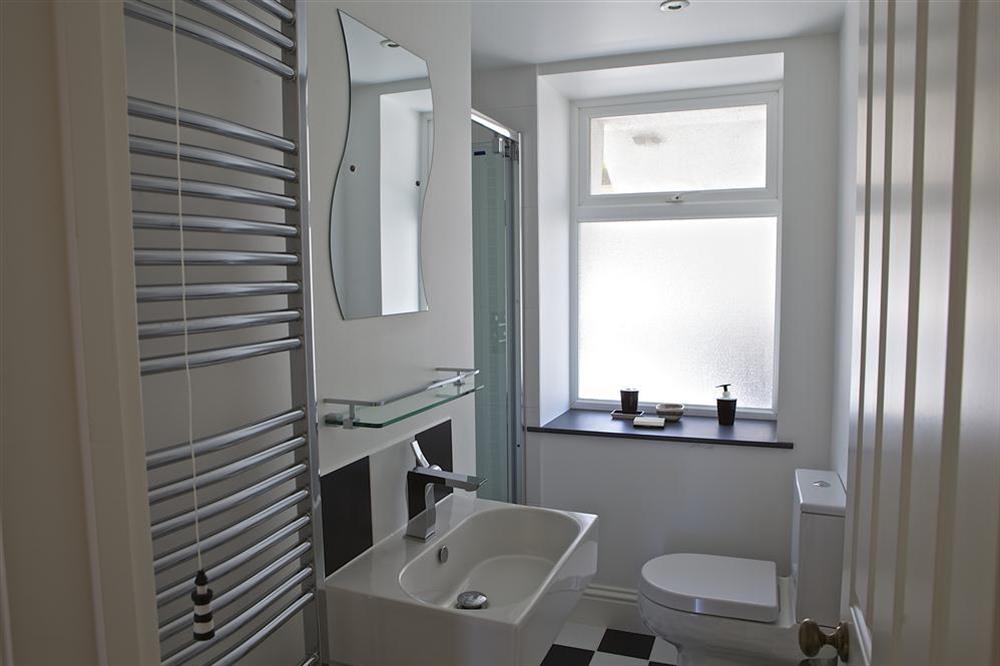 Modern bathroom with rainforest shower at Edinburgh House in , Salcombe
