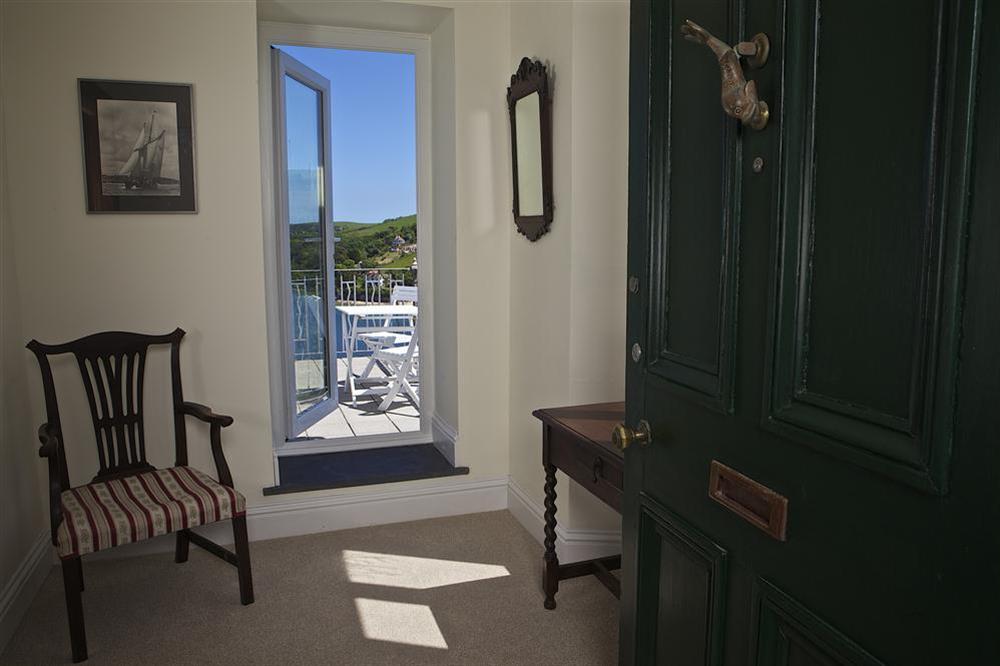 Small reception room leads to the balcony and that wonderful view at Edinburgh House in , Salcombe
