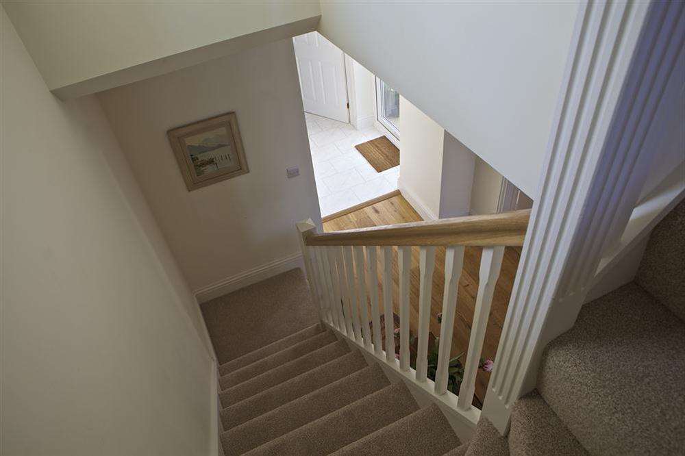 Stairs lead down to lower ground floor at Edinburgh House in , Salcombe