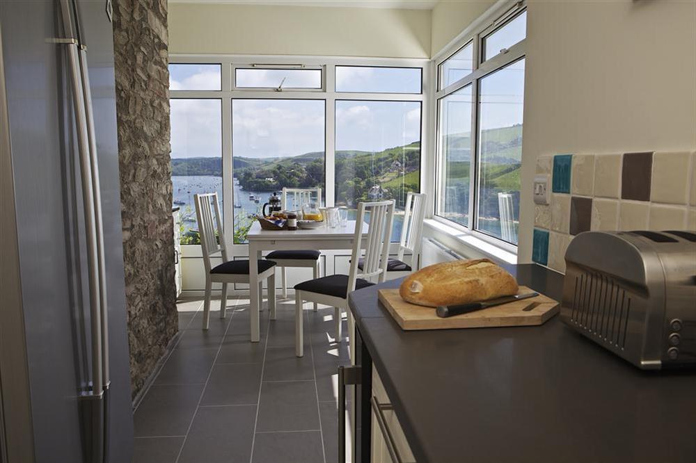 Stunning breakfast area with views over the estuary at Edinburgh House in , Salcombe