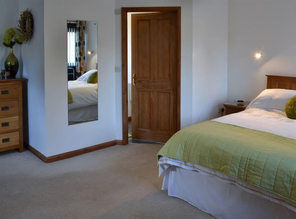 Double bedroom (photo 3) at Eglos Derry Farm Cottage in Helston, Cornwall