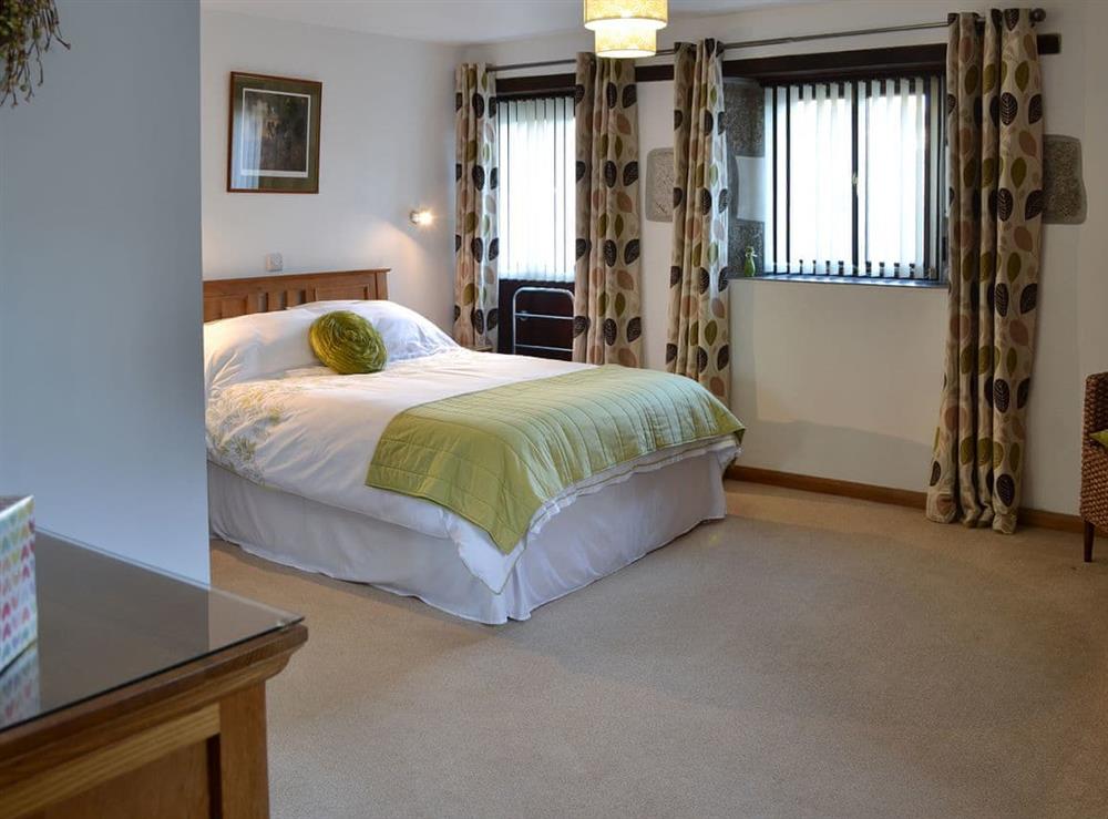 Double bedroom at Eglos Derry Farm Cottage in Helston, Cornwall