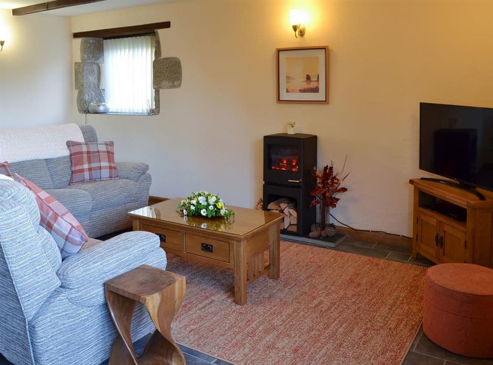 Living area at Eglos Derry Farm Cottage in Helston, Cornwall