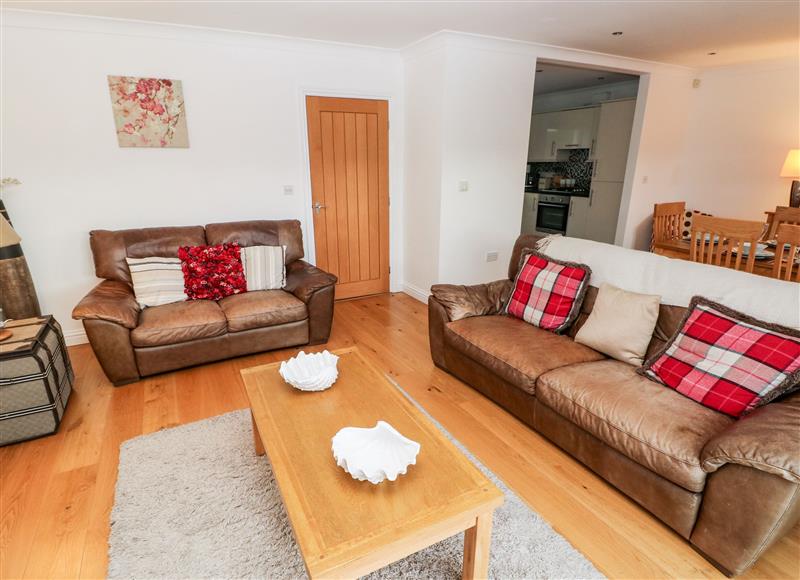 Relax in the living area at Egret, Milford Haven