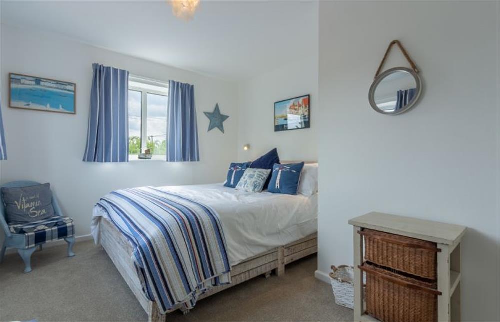 First floor: Bedroom two with a double bed at Egret, South Creake near Fakenham