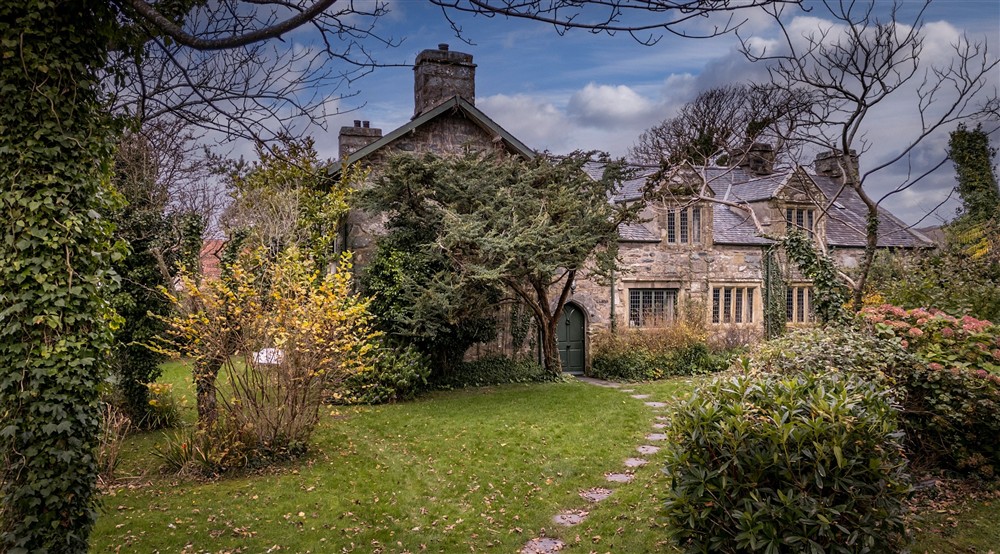 A large private garden with mature trees surrounds Egryn, Wales at Egryn in Nr Barmouth, Gwynedd