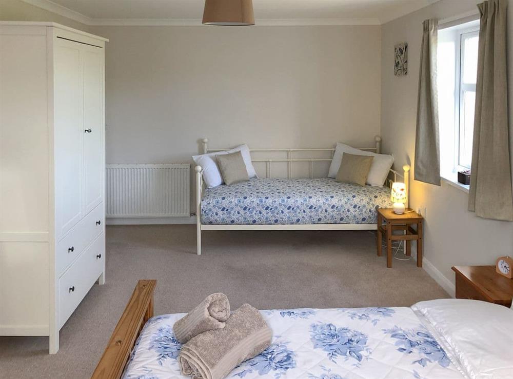 Double bedroom with an additional day bed at Egypt in near St Margaret’s Hope, Isle Of Orkney