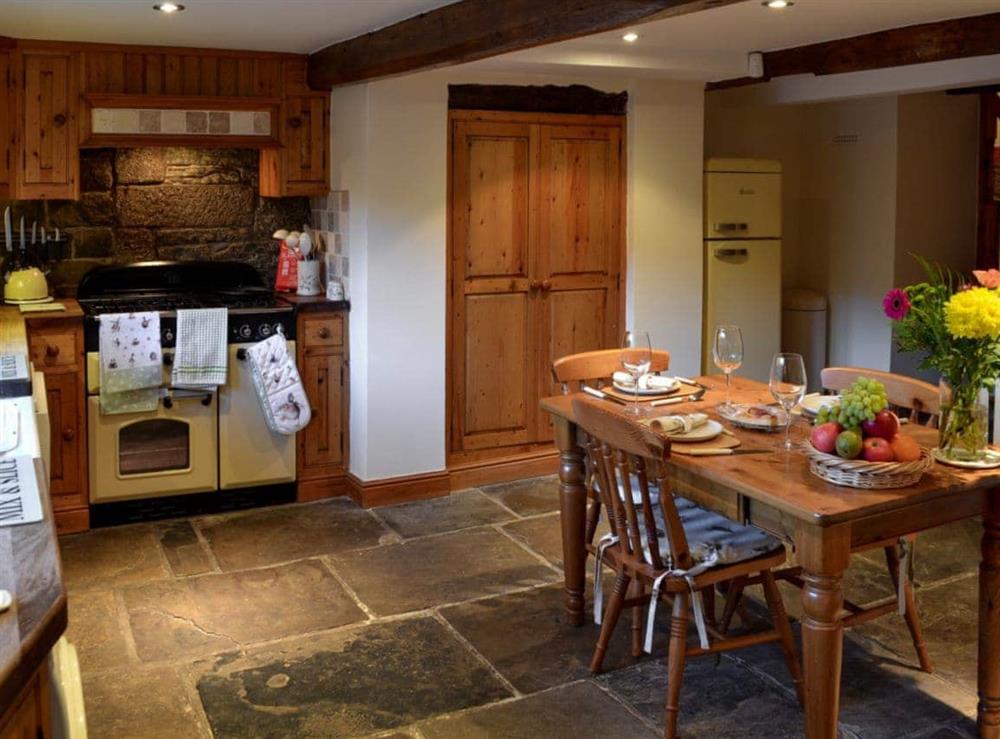 Kitchen & dining area at Eider Cottage in Holmfirth, West Yorkshire