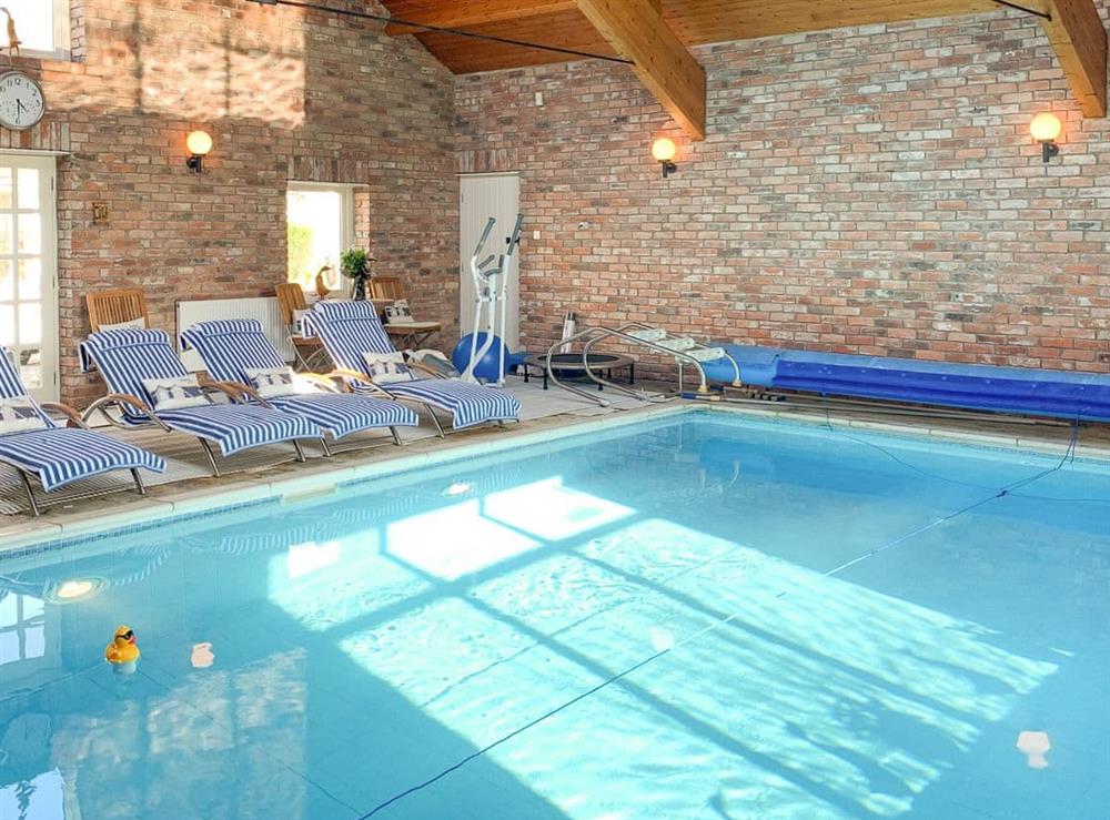 Swimming pool area can be booked at small extra cost at Eider Cottage in Holmfirth, West Yorkshire