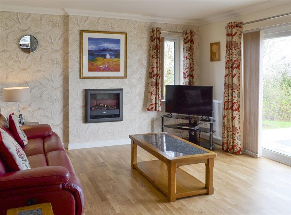 Welcoming living room at Eilean View (Island View) in Inverasdale by Poolewe, Ross-Shire