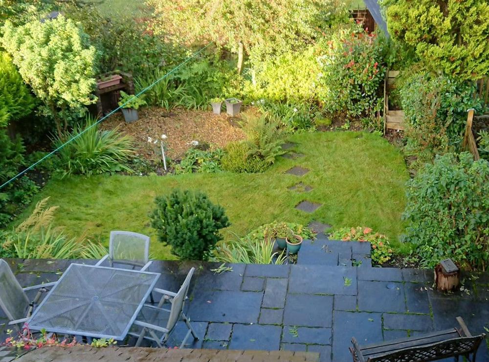 Spacious enclosed lawned garden and patio at Eirianfa in Penmachno, near Betws-y-Coed, Conwy, Gwynedd
