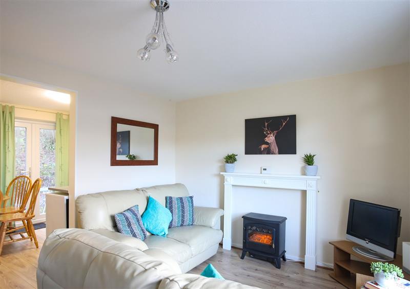 Relax in the living area at Eirlys, Glandwr near Caeathro