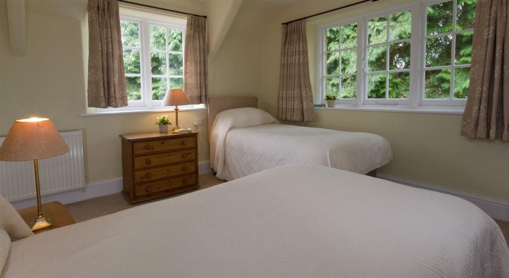 The twin bedroom at Elbow Cottage in St Dominick, Cornwall