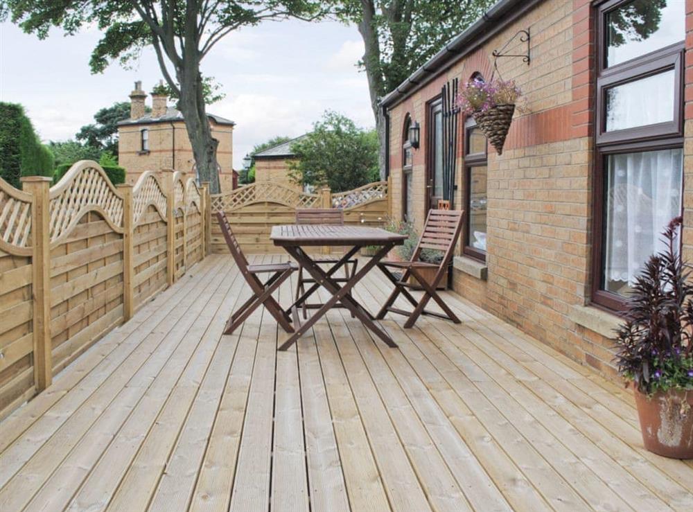 Sitting-out-area at Eldin Hall Cottage Four in Cayton Bay, near Scarborough, North Yorkshire