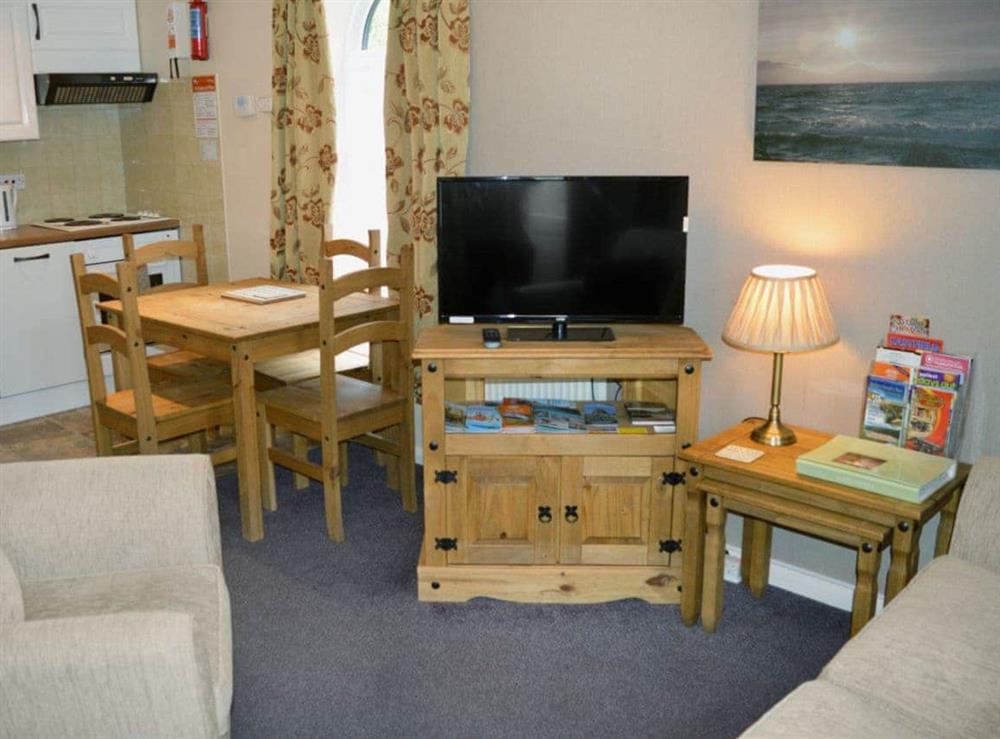 Homely living room at Eldin Hall Cottage Three in Cayton Bay, near Scarborough, North Yorkshire