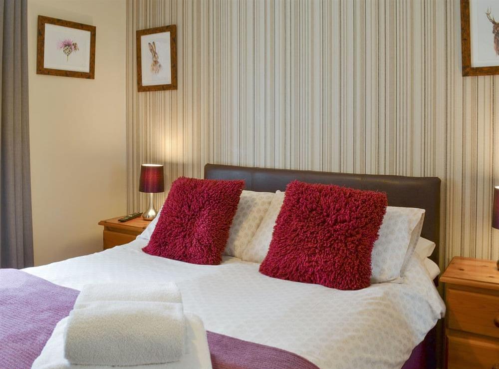 Relaxing en-suite double bedroom at Cottage Two, 