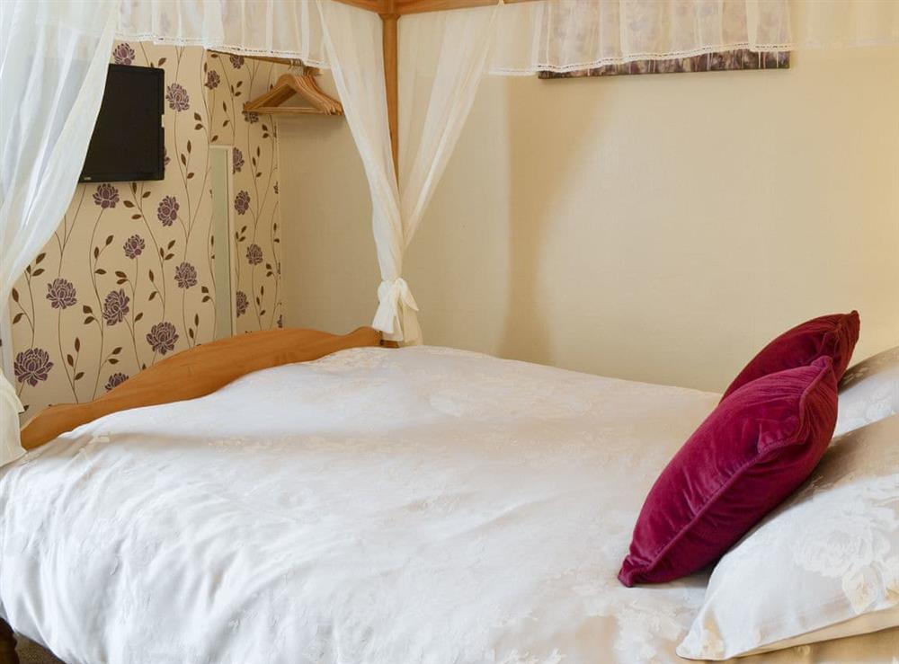 Peaceful four poster double bedroom at The Gatehouse, 