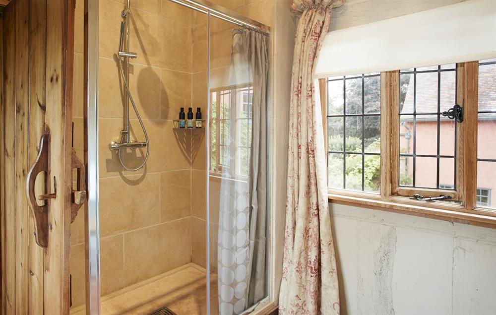 Bathroom with large bath, walk-in shower and under floor heating (photo 2) at Elinor Fettiplace, Pauntley