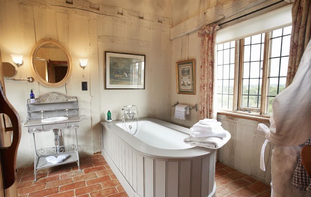 Bathroom with large bath, walk-in shower and under floor heating at Elinor Fettiplace, Pauntley
