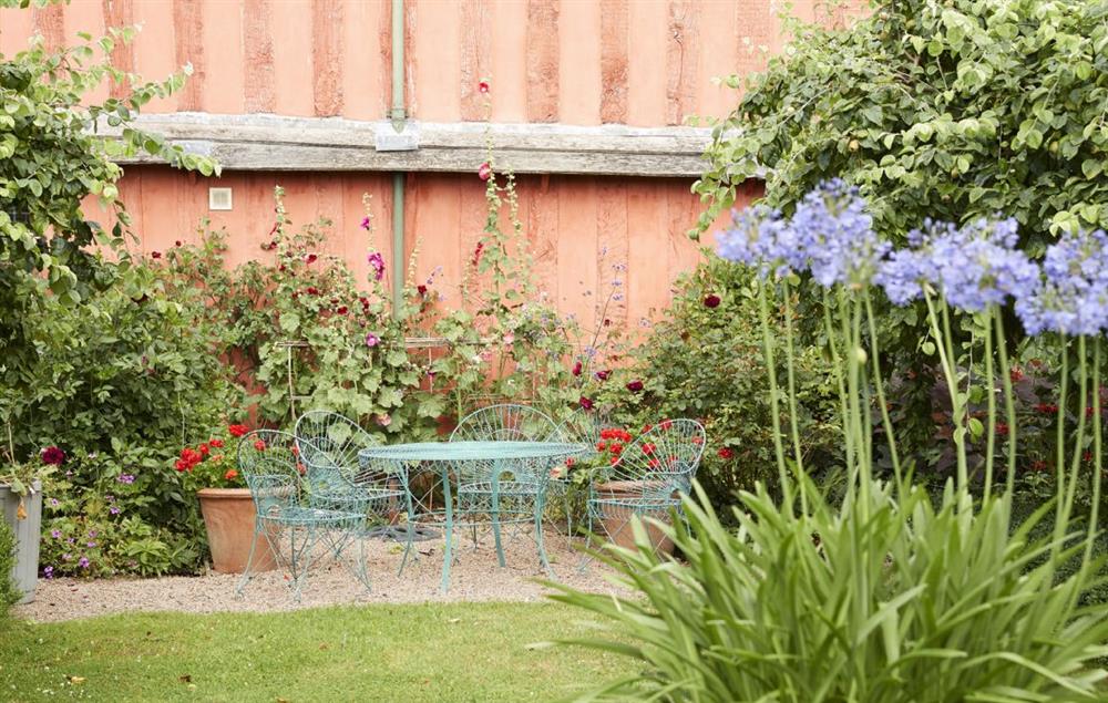 Relax in the garden surrounded by beautiful flora at Elinor Fettiplace, Pauntley