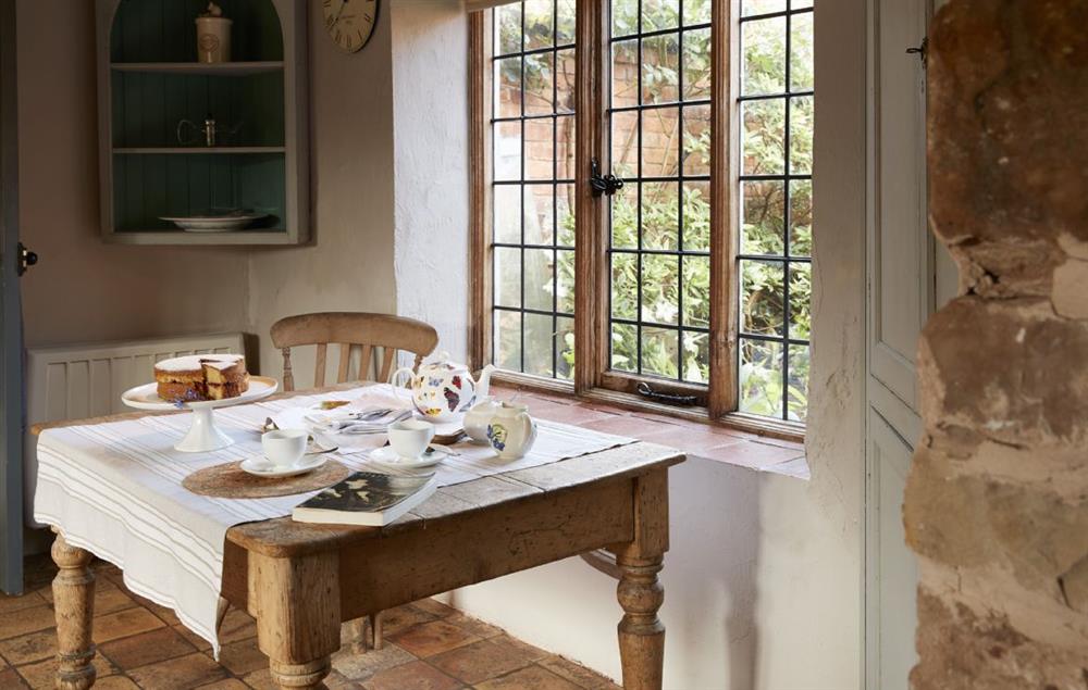 The breakfast table in the kitchen has views to the garden at Elinor Fettiplace, Pauntley