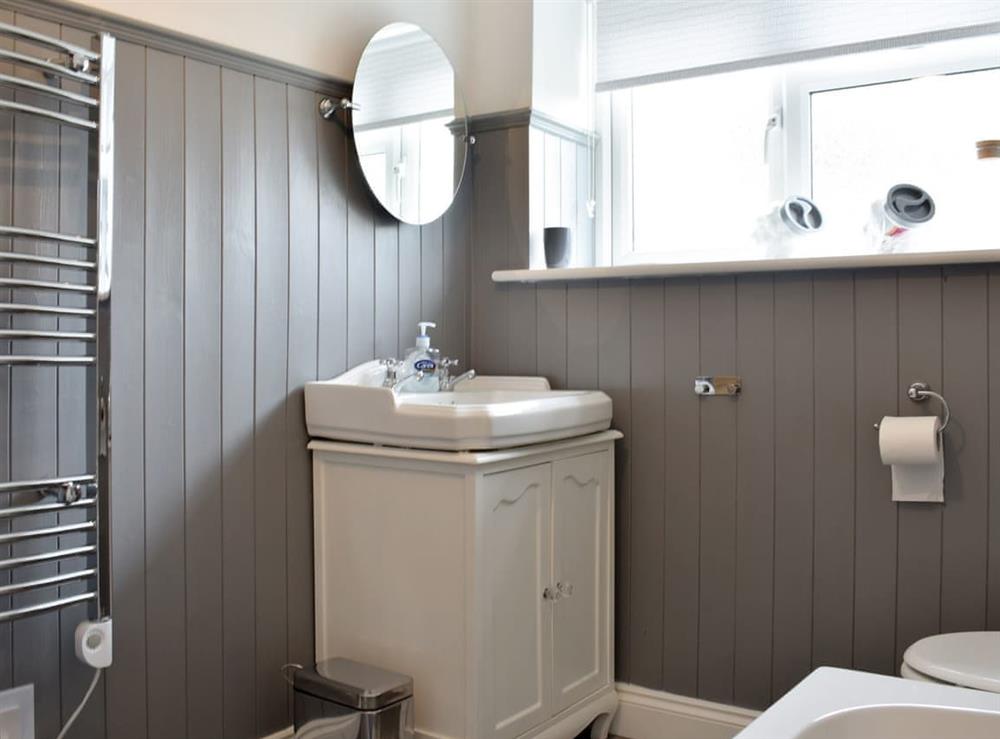 Bathroom with heated towel rail at Elizabeth Cottage in Hinderwell, near Whitby, North Yorkshire