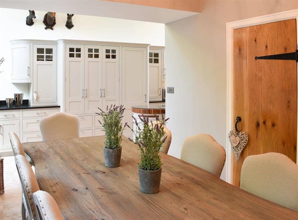 Dining area and kitchen at Elleray Cottage in Windermere, Cumbria