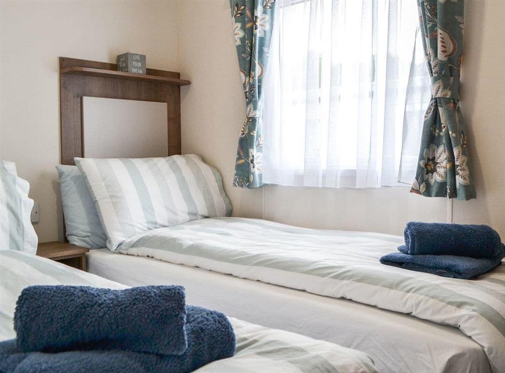 Twin bedroom at Ellerbeck Lodge in Brigham, near Cockermouth, Cumbria