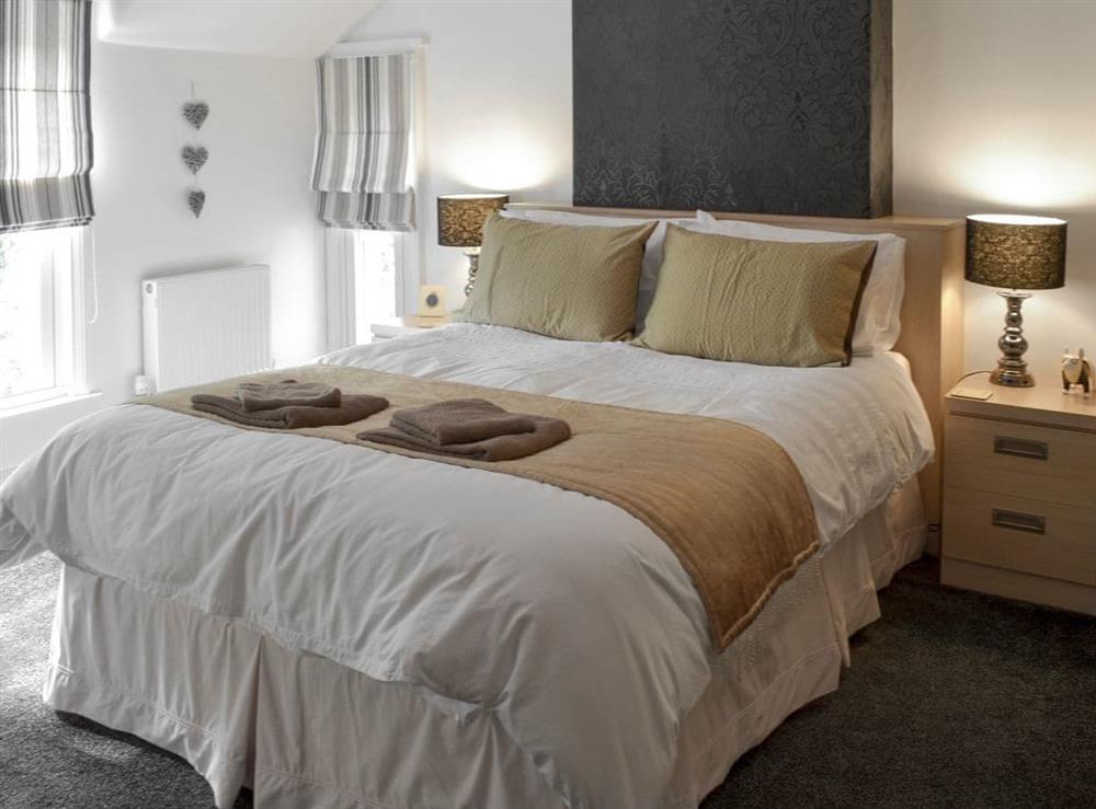 Tranquil bedroom with King-size bed at Ellerside in Cark, near Cartmel, Cumbria