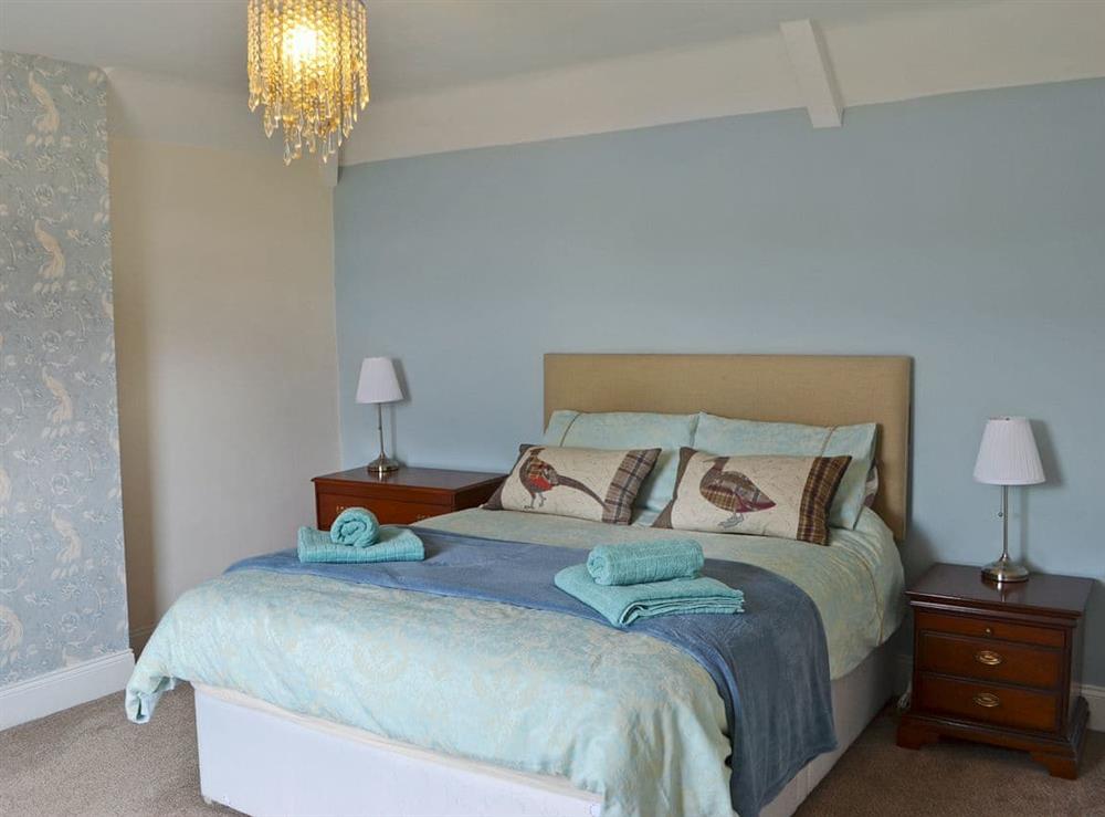 Elegant double bedroom with kingsize bed at Elm Croft in Falstone, near Bellingham, Northumberland