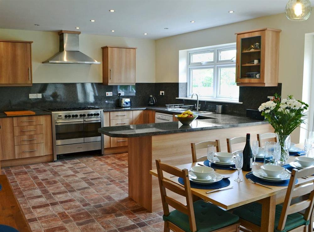 Spacious kitchen/dining room with French doors to patio at Elm Croft in Falstone, near Bellingham, Northumberland