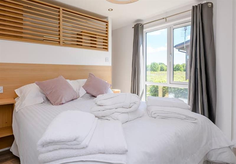 One of the bedrooms in the View Lodge at Elm Farm Country Park in Thorpe-Le-Soken, Essex