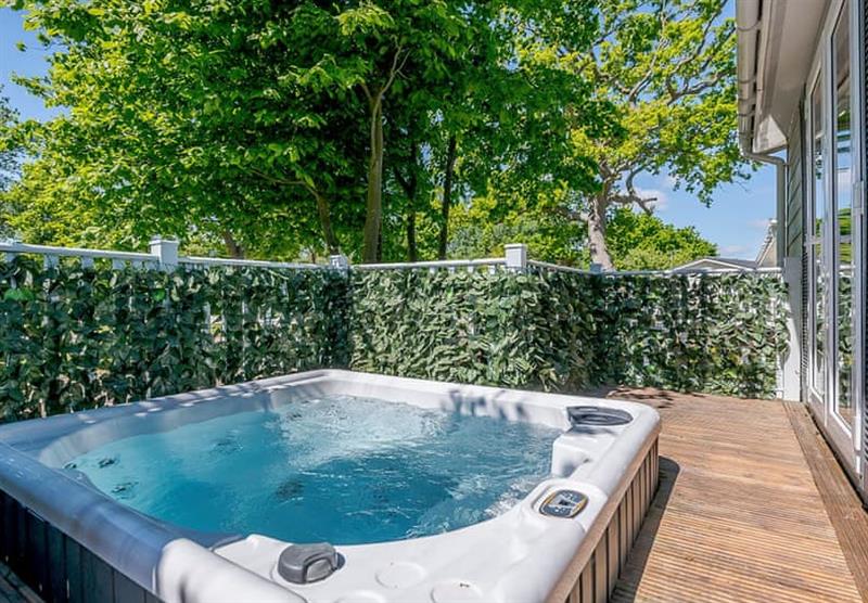 Private hot tub in the La Belle Maison 4 at Elm Farm Country Park in Thorpe-Le-Soken, Essex